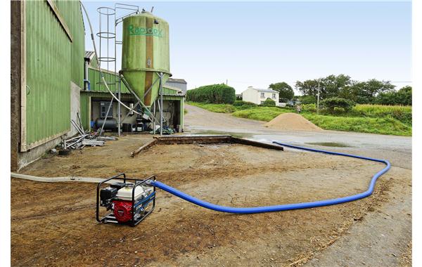 Transferring contaminated water for agriculture using an SDMO water pump